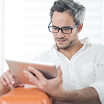 man using a tablet.